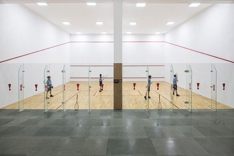 Students playing badminton at BLS World School